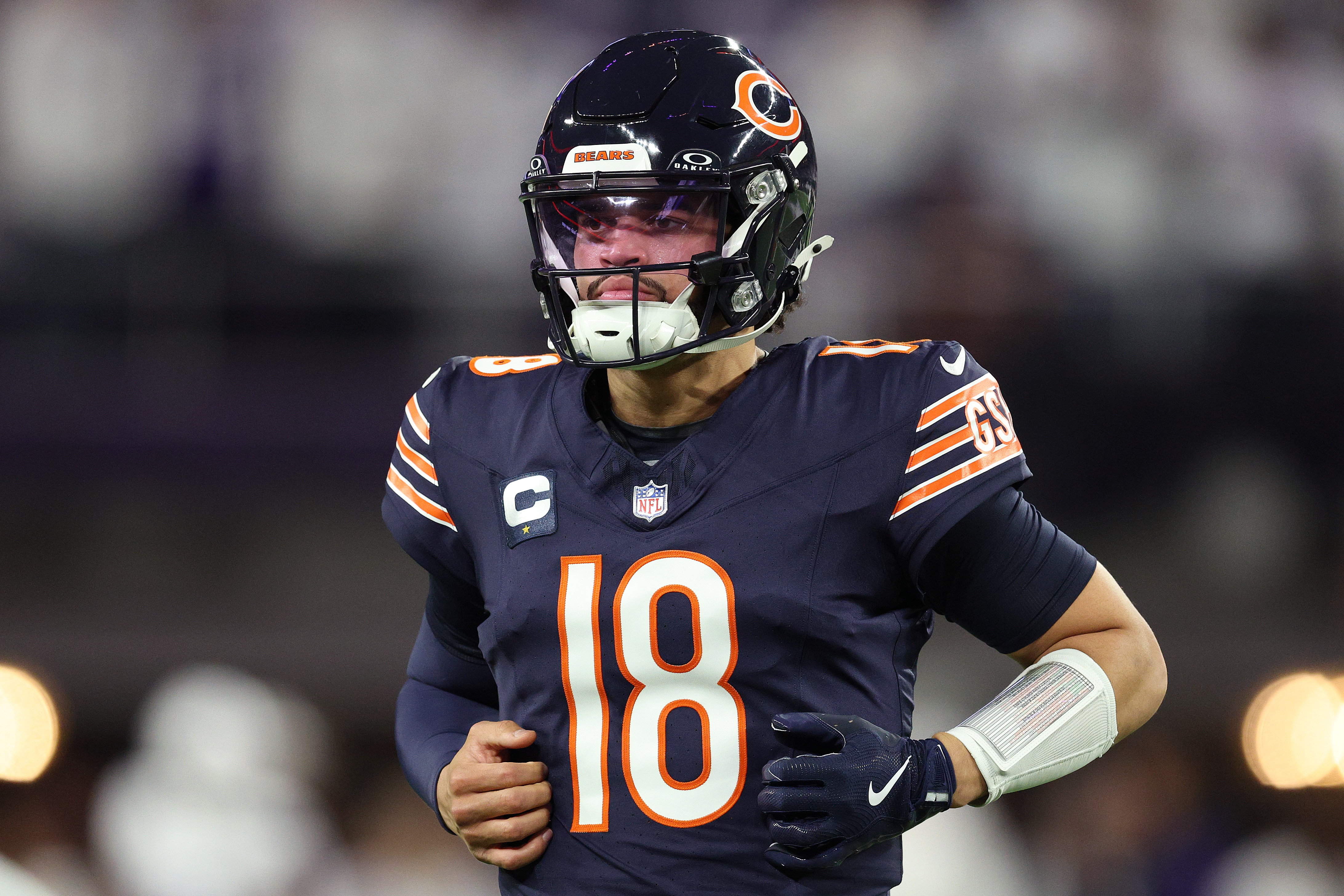 MINNEAPOLIS, MINNESOTA – DECEMBER 16: Quarterback Caleb Williams #18 of the Chicago Bears warms up prior to a game against the Minnesota Vikings at U.S. Bank Stadium on December 16, 2024 in Minneapolis, Minnesota. (Photo by David Berding/Getty Images)